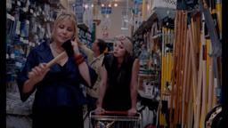 Jennifer Coolidge has an ax to grind