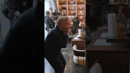 Adam Sandler gifts a gold jacket to Christopher McDonald