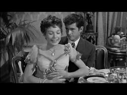 Cornelius puts his hands around Irene's waist