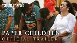 Paper Children Trailer- (Niños de papel) | Love brings a family together. Will a system tear them apart?