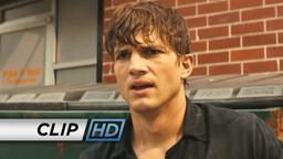 Spencer running from a car