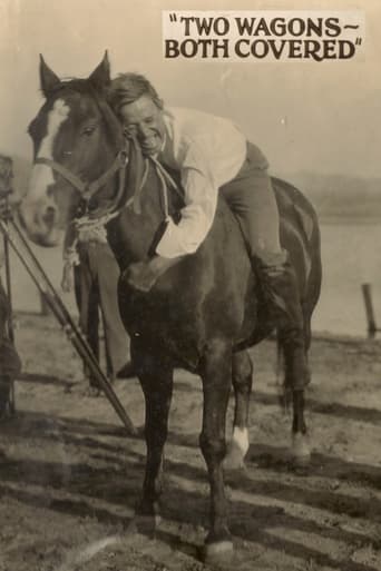 Two Wagons Both Covered Poster